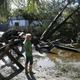 Cindy Stayvely looks at some of the damage in the Colonial Quarter after Hurricane Matthew passed through the area on October 8, 2016 in St Augustine, Florida. Across the Southeast, cver 1.4 million people have lost power due to Hurricane Matthew which has been downgraded to a category 1 hurricane on Saturday morning. (Image: Getty)
